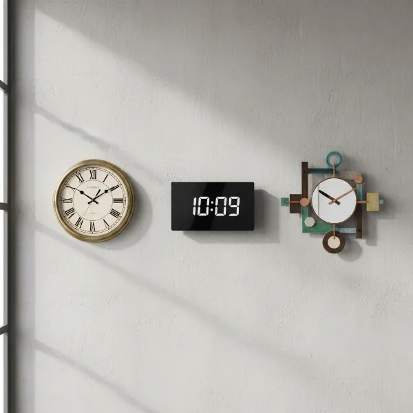 Various types of wall clocks including traditional analog, sleek digital, and artistic designs.